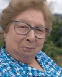 Dña. María Teresa Pérez Cobo