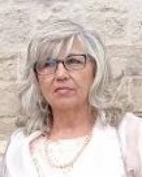 Dña. Dora Camus González