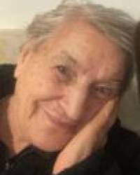 Dña. Emilia Martínez García