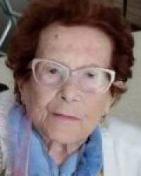 Dña. Iluminada Romero Delgado