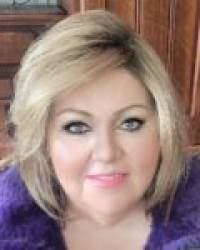Dña. Margarita Crespo López