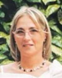 Dña. María Isabel Gómez Amenabar