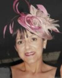 Dña. María Reyes Chiva Aristi