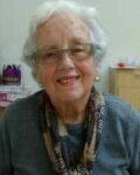 Dña. María Robledo García