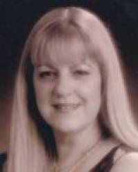 Dña. María Rosa García Sánchez
