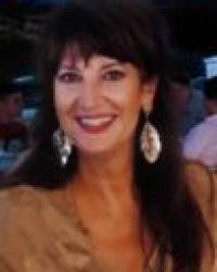 Dña. María Rosario Rodríguez Adrados
