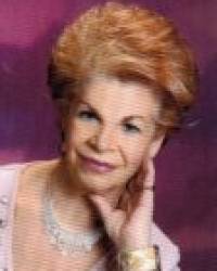 Dña. Mercedes Abad Cruz