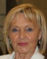Dña. María Suceso García Gallo
